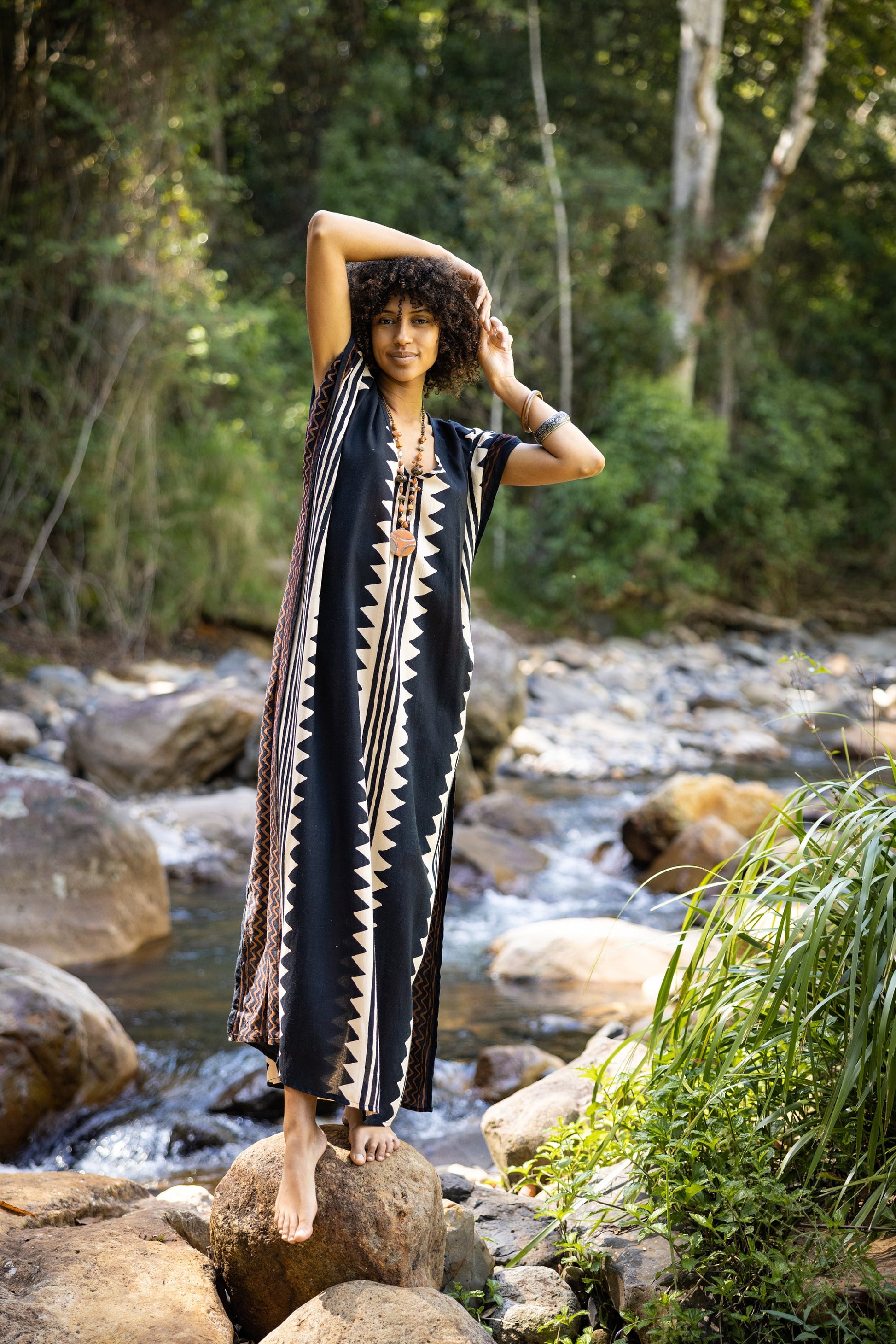 Introducing our ELGA kaftan maxi dress, a stunning piece that combines comfort and style. Made from an ultra-soft, breathable, free-flowing rayon-cotton fabric, this dress is designed to keep you cool and comfortable, no matter the occasion.